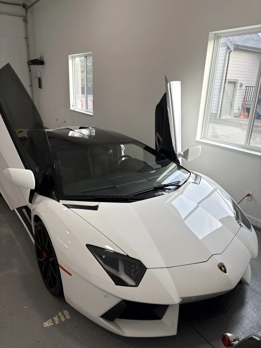 White Lamborghini Aventador with premium ceramic window tint installed at WPEG Customs Winnipeg